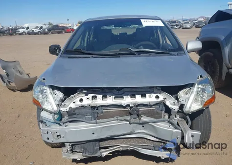 2009 Toyota Yaris z USA, uszkodzony, nr VIN JTDBT903X94059397